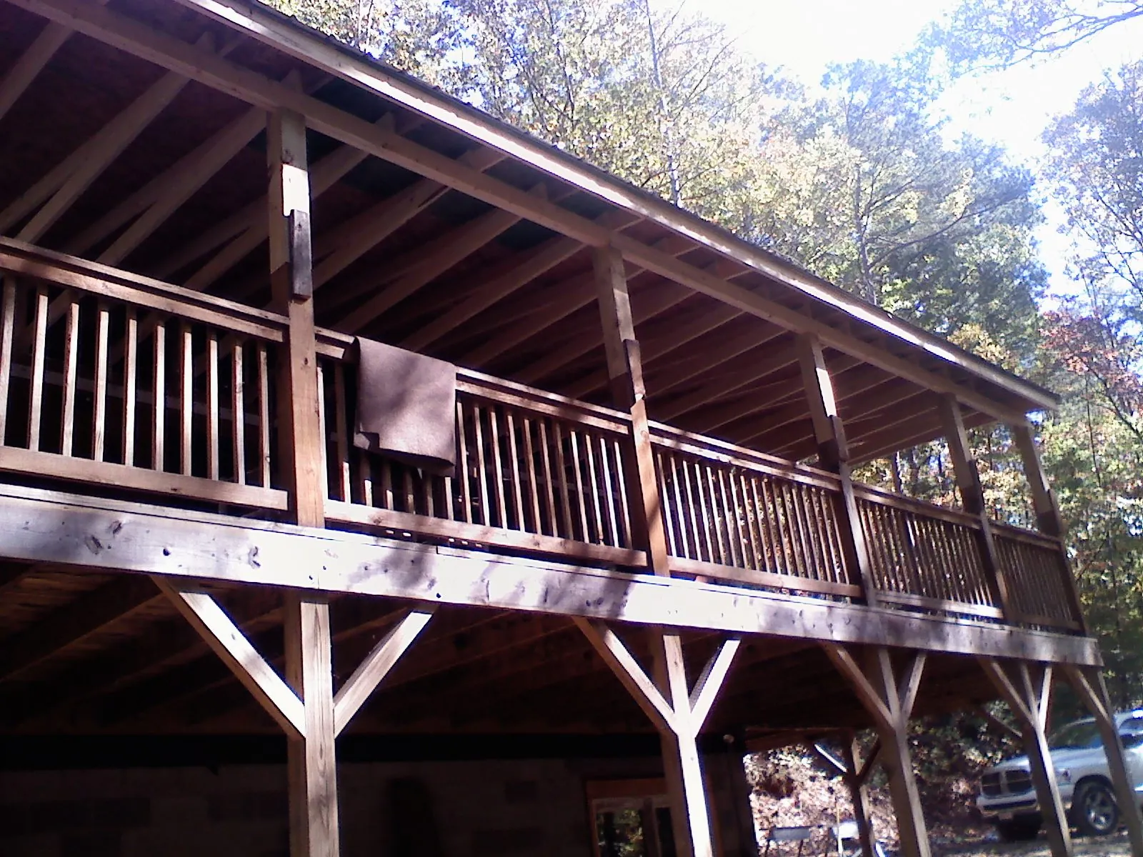 Timber framing under a new elevated porch and deck — Roof Leak Repair in Roxbury Crossing by Roofing Brothers